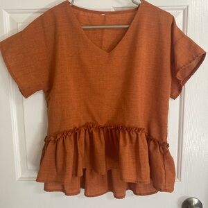 Women's Orange Ruffle Hem Top